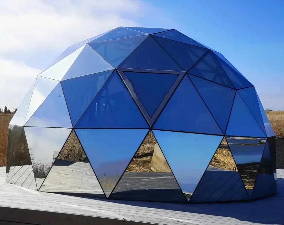 Mirrored glass geodesic dome kit on a deck
