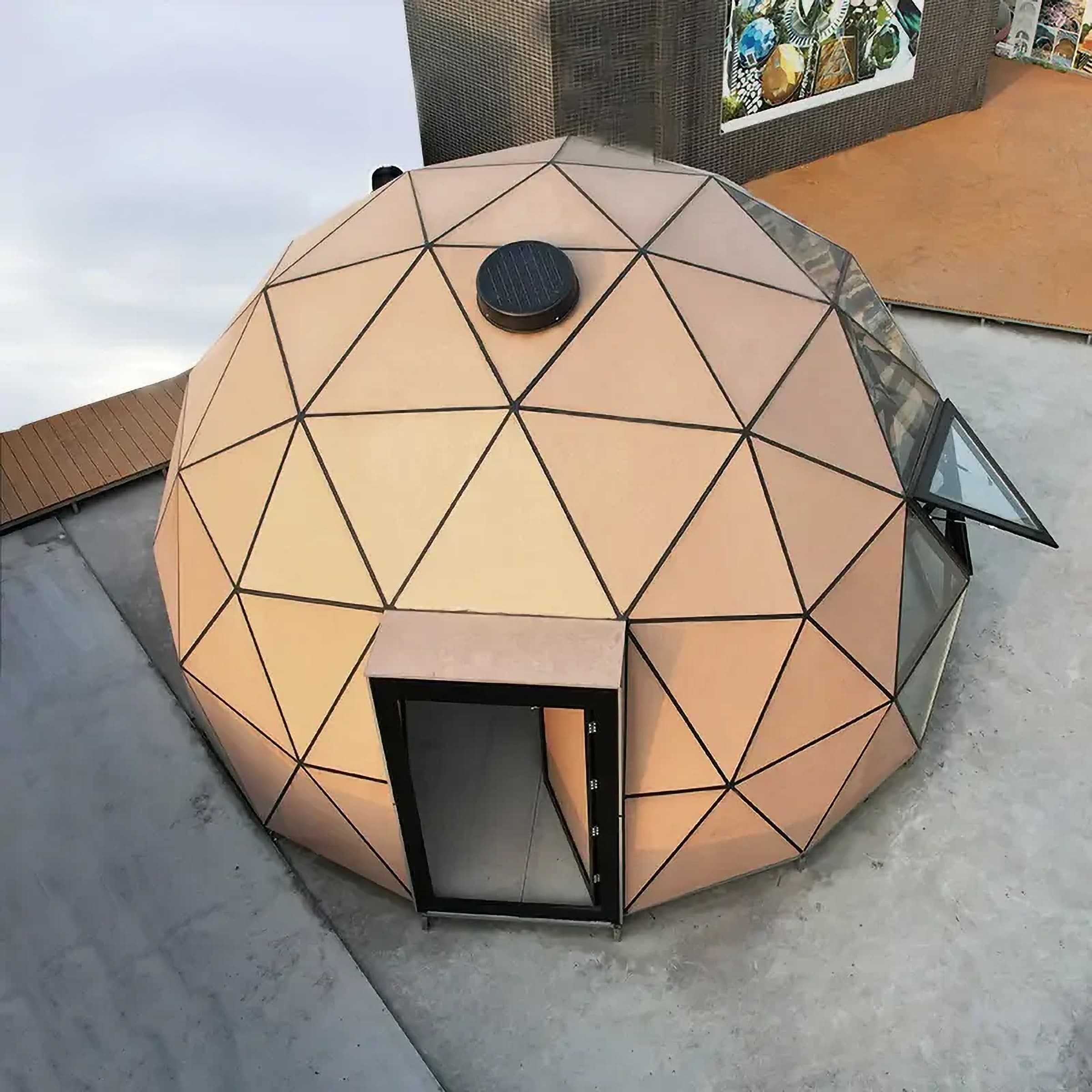 Insulated wooden and glass glamping dome