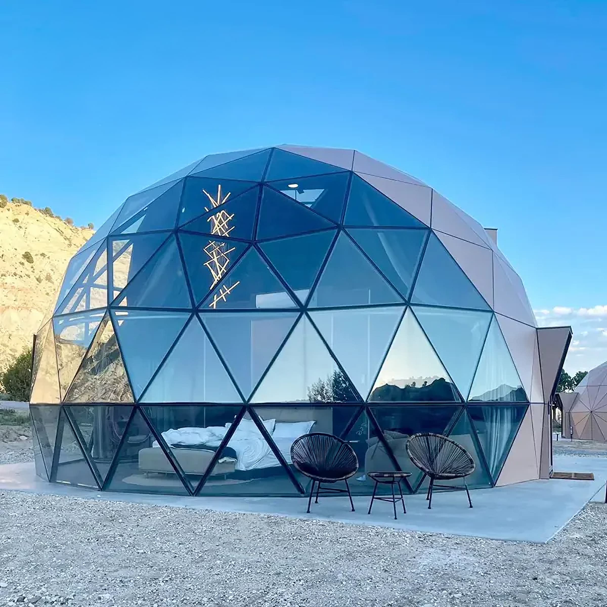 Tetra Hybrid dome with glass and a wood-grain panel section