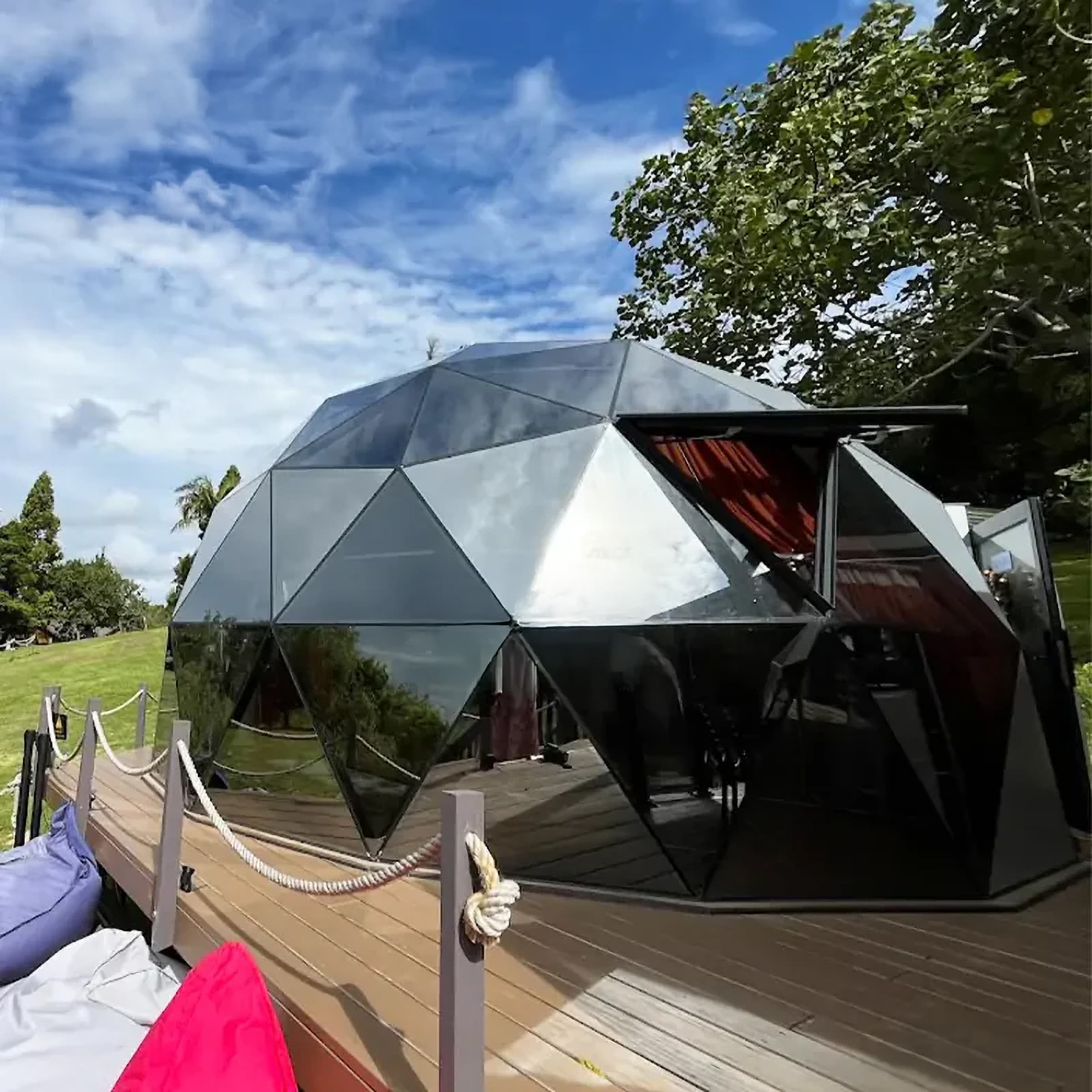 Hybrid geodesic dome with glass and solid panels