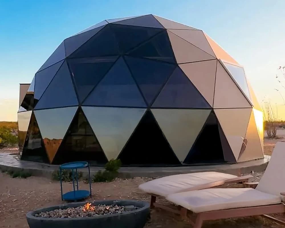 Tetra Hybrid dome at sunset with lounge chairs