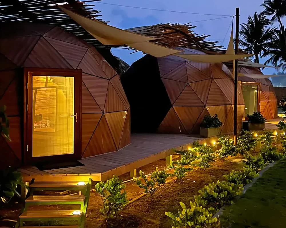 Hybrid geodesic dome house kit with glass and insulated panels. Perfect for glamping, Airbnb, or eco-resorts. Built to last by The Dome House. - Image 2