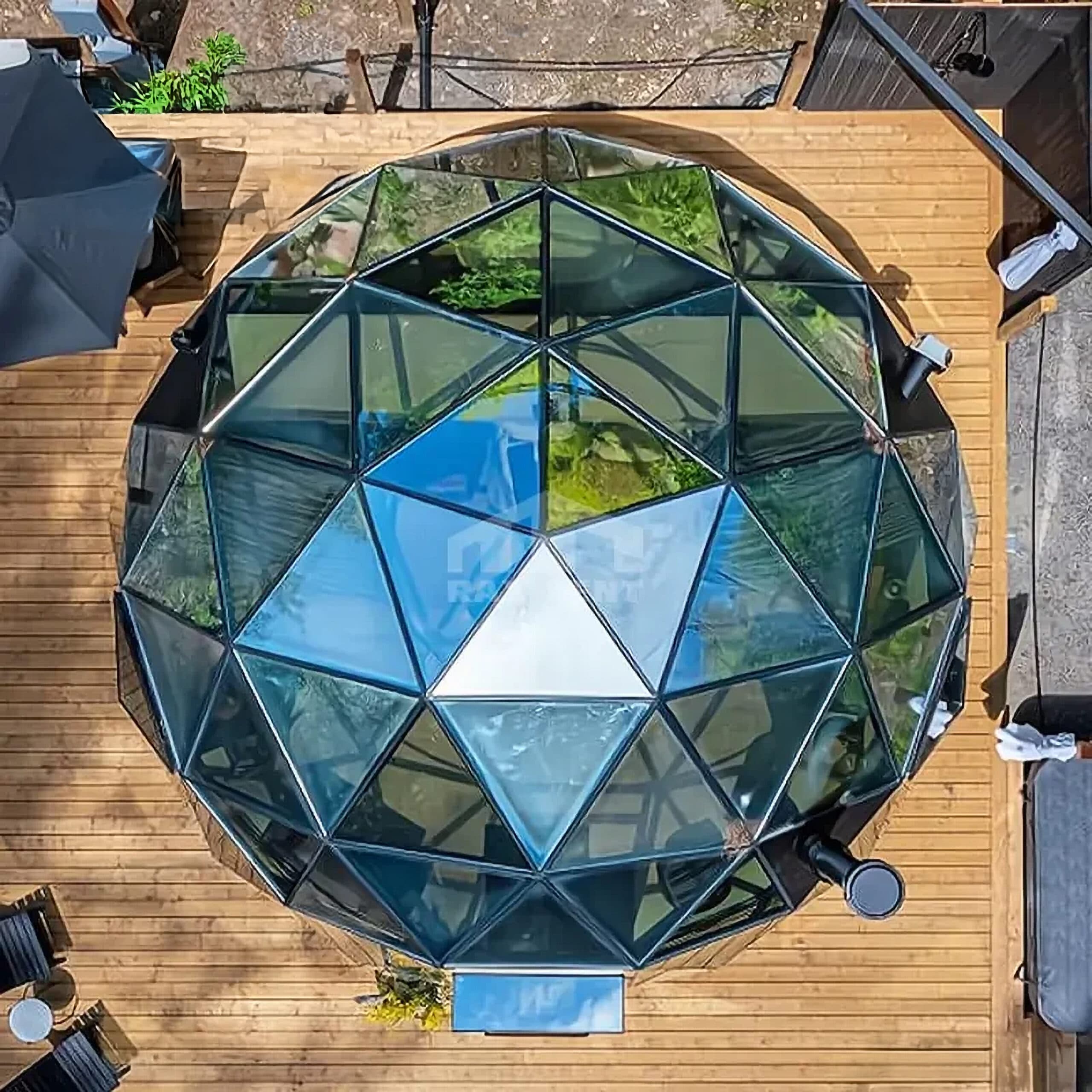 A glass geodesic dome seen from above